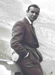 Sean_Connery_suited_Goldfinger_Aston_Martin.jpg
